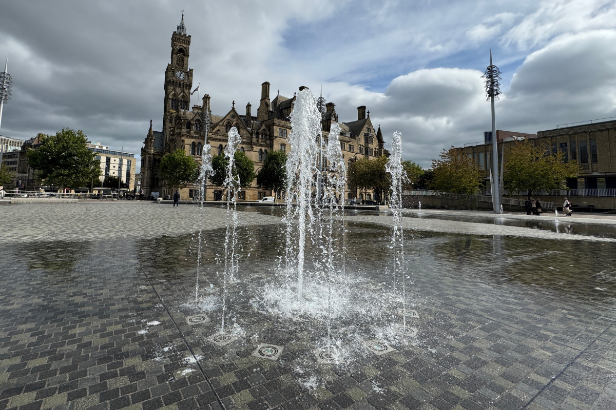 The fountains in front of Bradford City Hall on a slightly sunny day 
